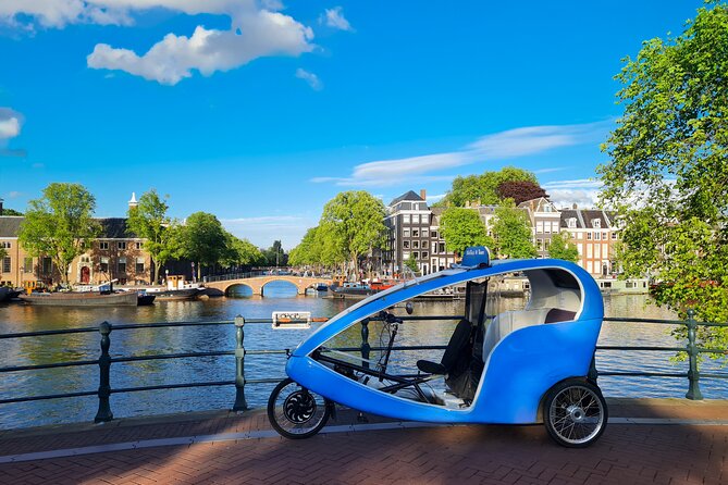 Amsterdam Pedicab City Tour (2 hours) - Why a private blue pedicab beats a bus for your first Amsterdam day
