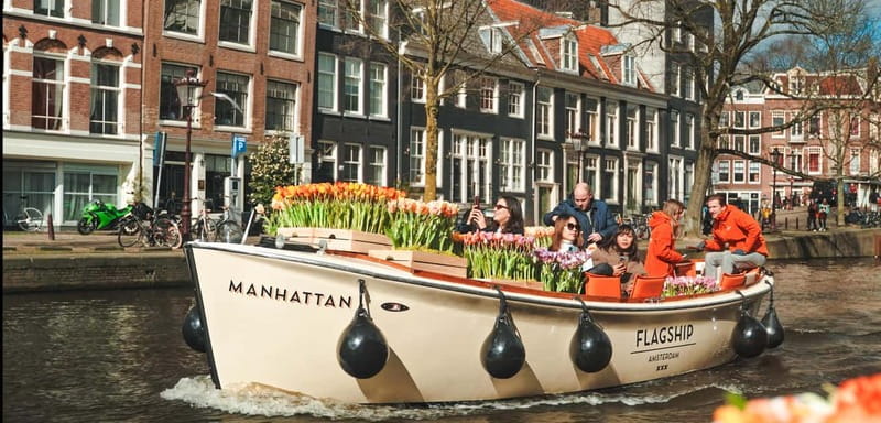 Amsterdam: Premium Tulip Boat Canal Tour - Premium tulip cruise value: $33 for a 10-seat canal moment