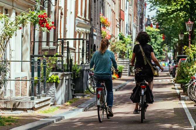 Amsterdam PRIVATE Bike Tour With Locals: Bike & Local Snack Included - Bikes, Traffic, and Comfort: What Moderate Fitness Really Means