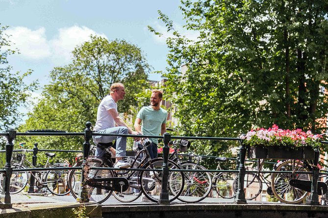 Amsterdam PRIVATE Bike Tour With Locals: Bike & Local Snack Included - Westerkerk: A Big Landmark, With Time to Actually Look