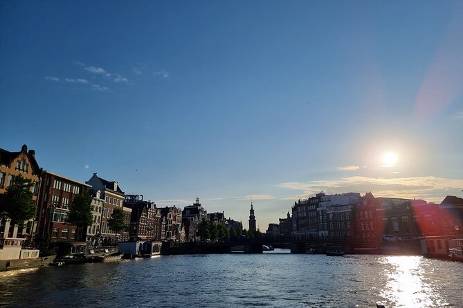 Amsterdam Private Boat Tour With Drinks - EN ES FR - Inside the Route: Narrow Canal Houses and the Miniature Tea Shop