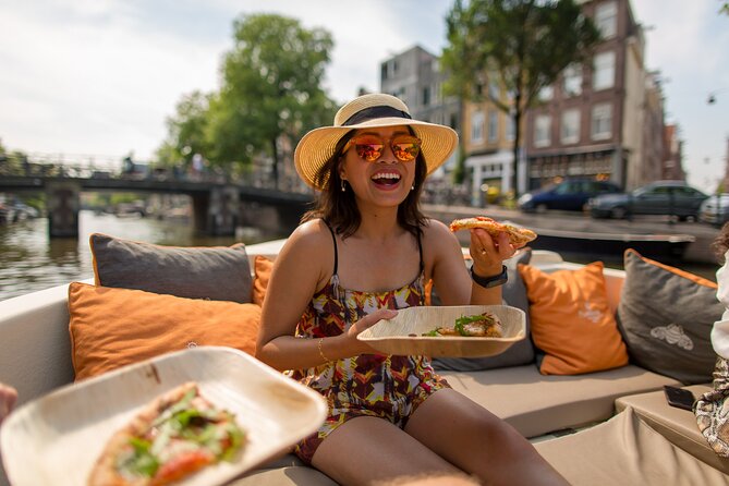Amsterdam Private Boat Trip with Pizza and Unlimited Drinks - Your boat ride mindset: it’s sightseeing at Amsterdam speed