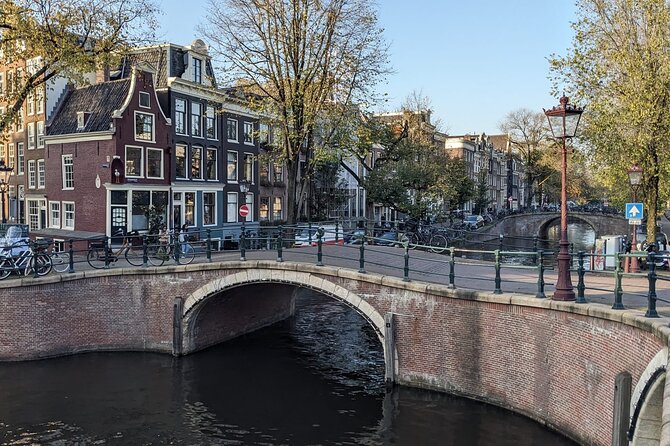Amsterdam private city walking experience with a local - Nieuwmarkt: the Waag, guild power, and the dancing houses