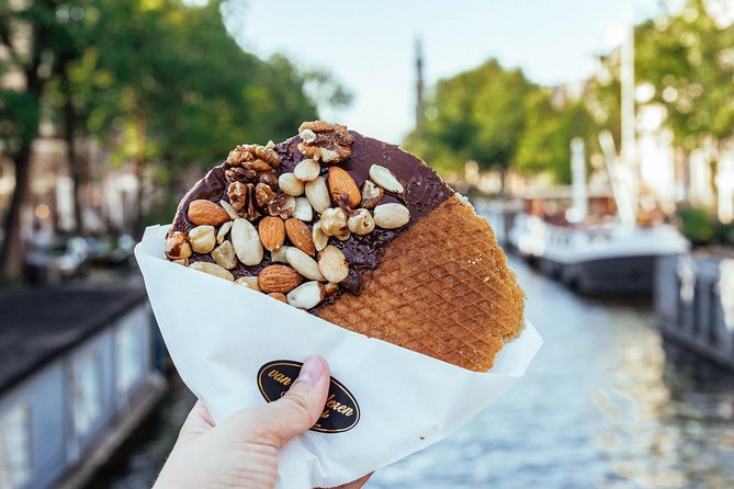Amsterdam Private Food Tour with Local Including 6 or 10 Tastings - De Pijp: Banksy context, local favorites, and a drink stop