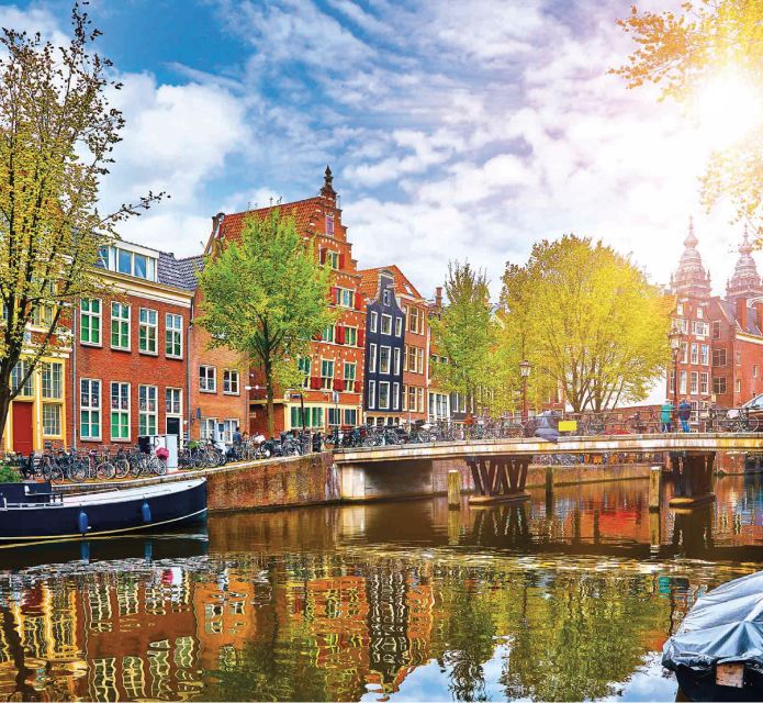 Amsterdam: Private Guided City Tour by Pedicab - Newmarket, Chinatown, and IJ bay views: how the city changes tone
