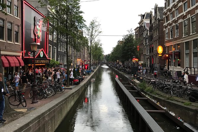 Amsterdam: Private Introduction Walking Tour (TOP RATED) - Nieuwmarkt and the Waag: markets, gates, and daily snacks