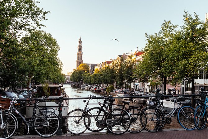 Amsterdam Private Tour: Highlights & Hidden Gems by Bike or Foot - Rembrandtplein: from butter-and-dairy market to city square