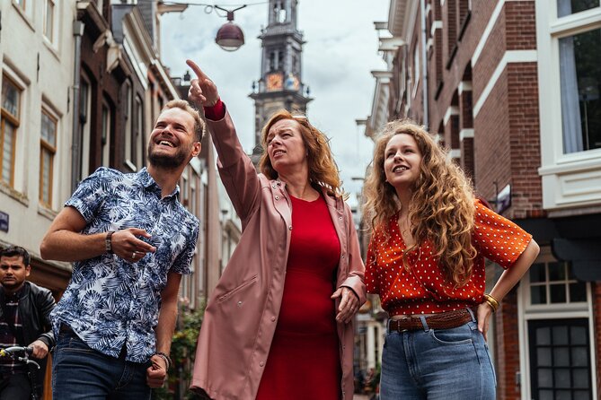 Amsterdam Private Tour: Highlights & Hidden Gems by Bike or Foot - Begijnhof’s hidden chapel: medieval calm inside a modern city