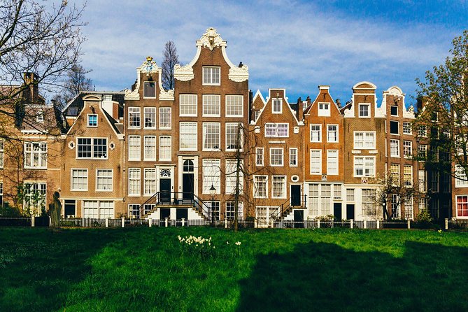 Amsterdam Private Tour: Highlights & Hidden Gems by Bike or Foot - Flower Market stalls: colorful, seasonal, and very practical