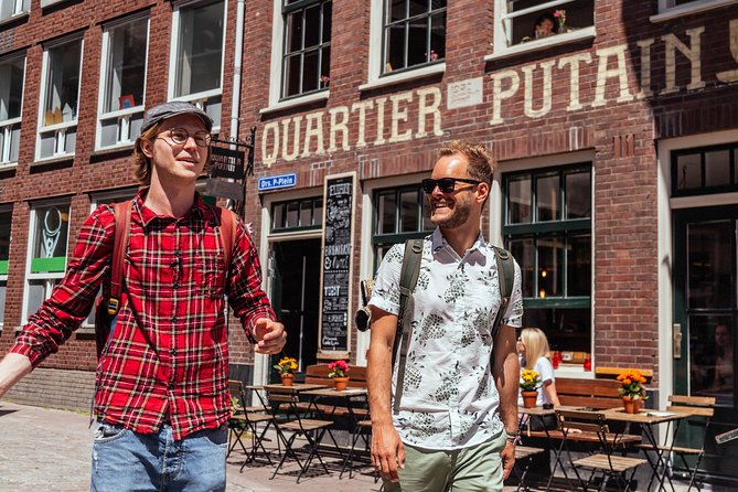 Amsterdam Private Tour: Highlights & Hidden Gems by Bike or Foot - Royal Palace on Dam Square: seeing power from street level