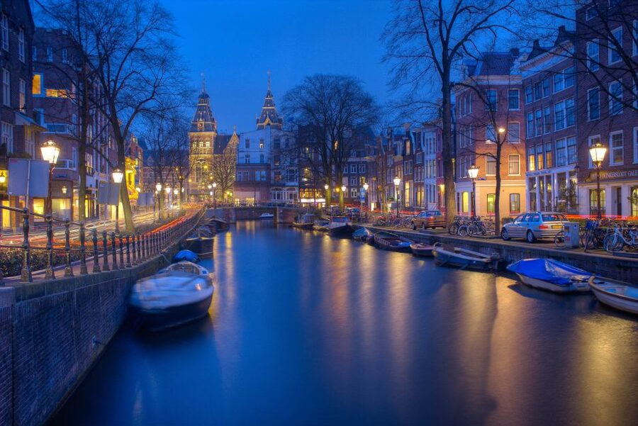 Amsterdam: Private Walking Tour with a Local - Queen Wilhelmina to Your First Real Street: How the Tour Starts