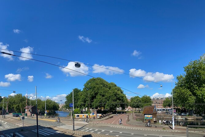 Amsterdam Private Walking Tour with Dinner Experience - Café Papeneiland and Noordermarkt: finishing the walk like locals do