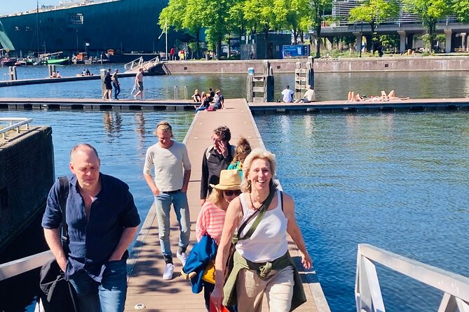 Amsterdam Private Walking Tour with Dinner Experience - Nieuwmarkt, Lastage, and the canal approach to Weigh House history