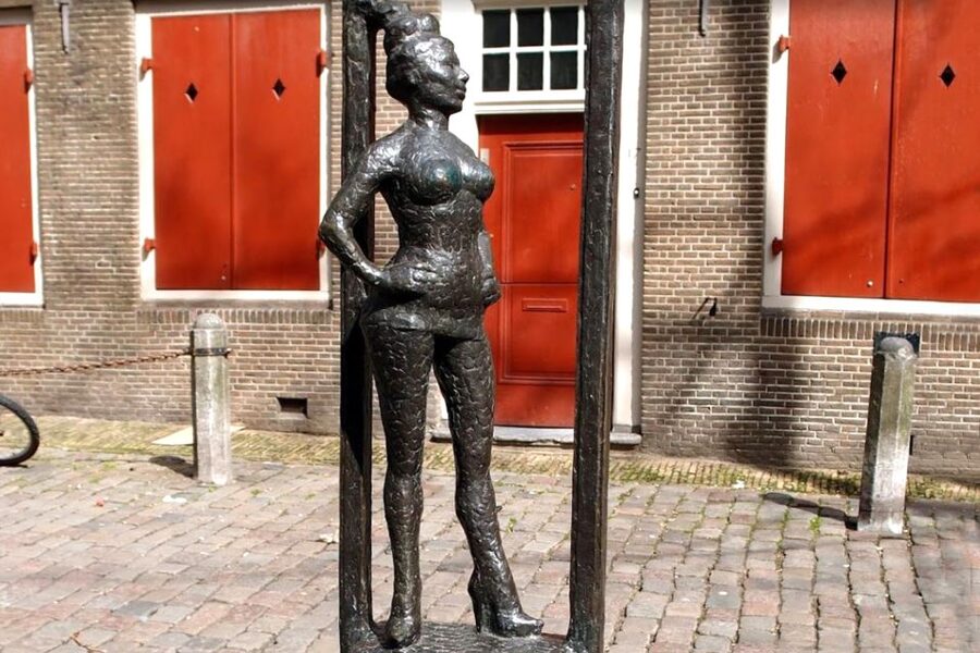Amsterdam: Red Light District 1-hour Smartphone Audio Tour - Ending at Nieuwmarkt and the Waag building: closure with meaning