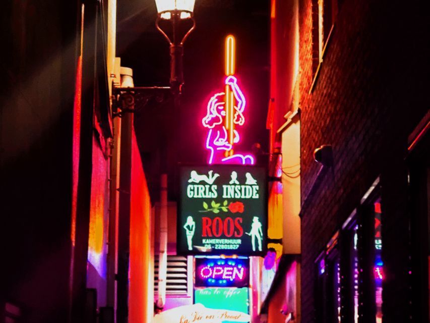 Amsterdam: Red Light District and Coffeeshop Culture Tour - The heart of the walk: red windows, the old church, and tight streets