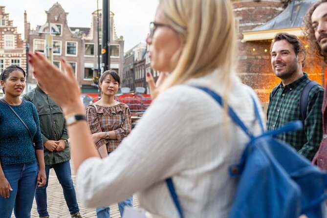 Amsterdam: Red Light District & City Tour (Private tour) - Dam Square setup: National Monument and the Royal Palace