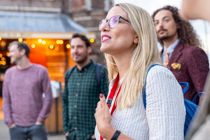 Amsterdam: Red Light District & City Tour (Private tour) - Oude Kerk and Warmoesstraat: from the oldest church to LGBTQ+ nightlife