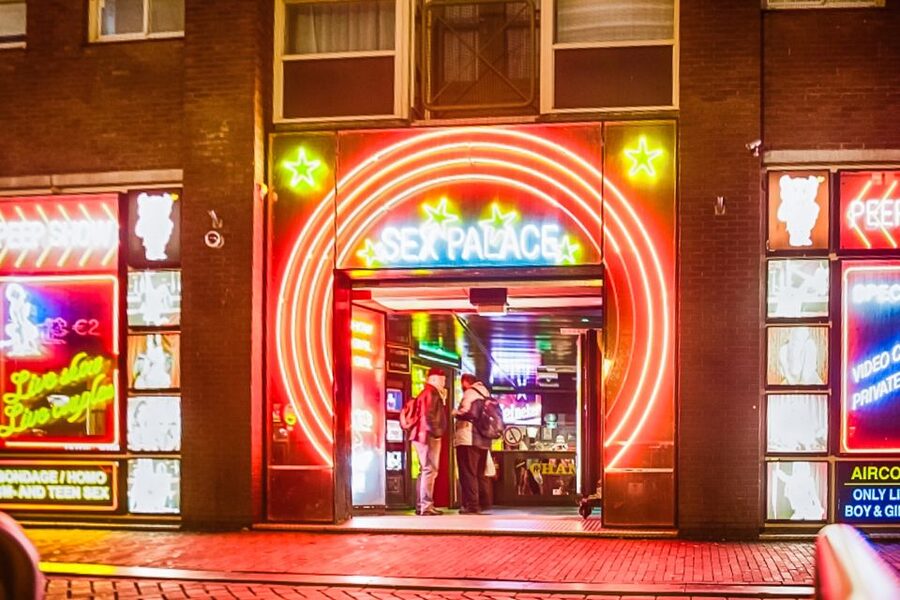 Amsterdam Red Light District & Coffee Shop Tour - Casa Rosso and the street-level mix of sex work and politics