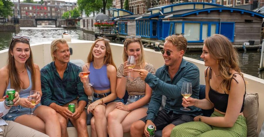 Amsterdam: Red-Light District Pub Crawl and Booze Boat Tour - Canal Cruise Meets an Instant Night Plan