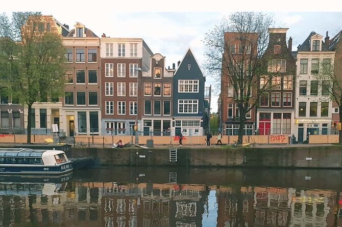 Amsterdam Red-light District Tour for Groups English or German - Chinatown Canals and Crooked Houses: The First Real Context Stop
