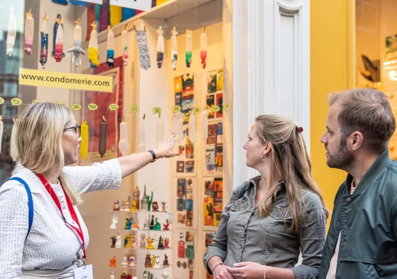 Amsterdam: Red Light District Tour in DE/EN/IT/ES/FR - Dam Square, Oude Kerk, and the streets that connect old Amsterdam to hard politics