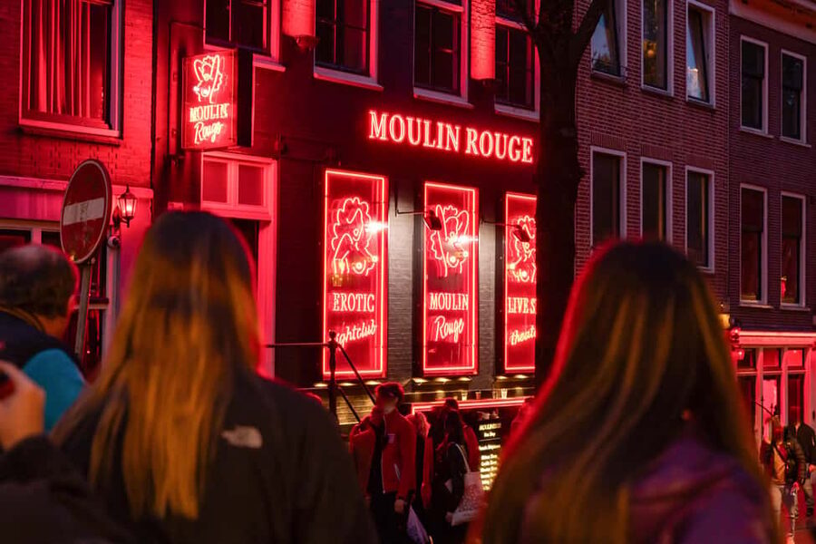 Amsterdam: Red Light District Tour in DE/EN/IT/ES/FR - Picking your language: choose German, English, Italian, Spanish, or French