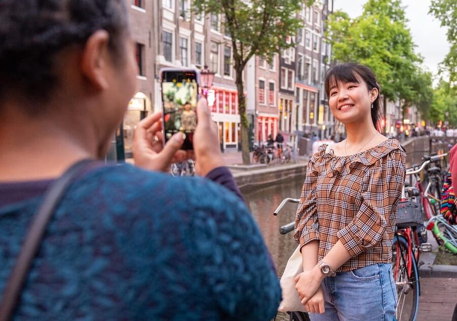 Amsterdam: Red Light Tour Exclusive + Peep Show - Starting at Dam Square: the tone is set fast
