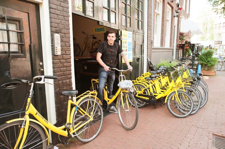 Amsterdam: Relaxed City Highlights Guided Bike Tour - Museumplein and P.C. Hooftstraat: from art density to luxury fashion