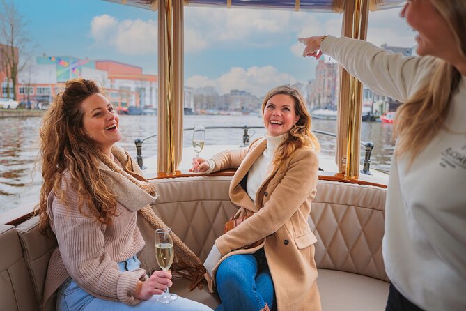 Amsterdam: Romantic Canal Cruise with Optional Bubbles & Bites - The onboard crew and commentary: why it feels smoother than a silent cruise