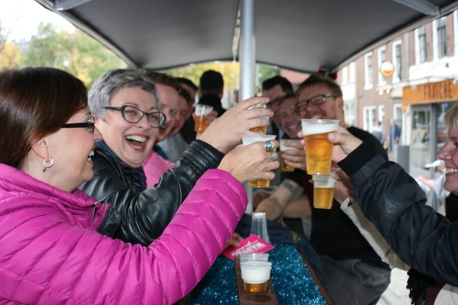 Amsterdam: Shared Party Bike Tour with Beer - Languages on the Bike: Your Guide and the Party Flow