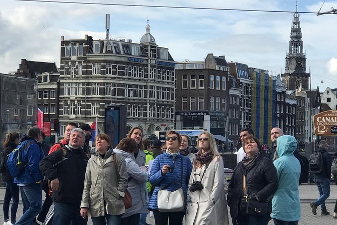 Amsterdam Sightseeing Tour + Hidden Gems + Tastings + PDF guide - Floating flowers at Bloemenmarkt (and why Munttoren matters)