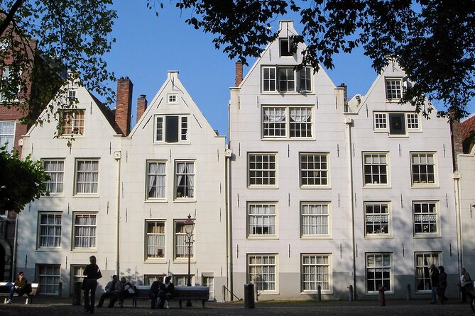 Amsterdam Sightseeing Tour + Hidden Gems + Tastings + PDF guide - Mouse Mansion and Kalverpassage: small stops with big storytelling power