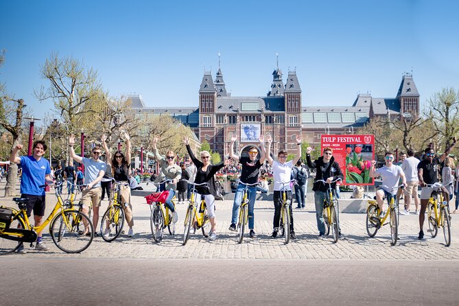 Amsterdam Small Group Bike Tour - Meeting point, bikes, and the real rule of the road