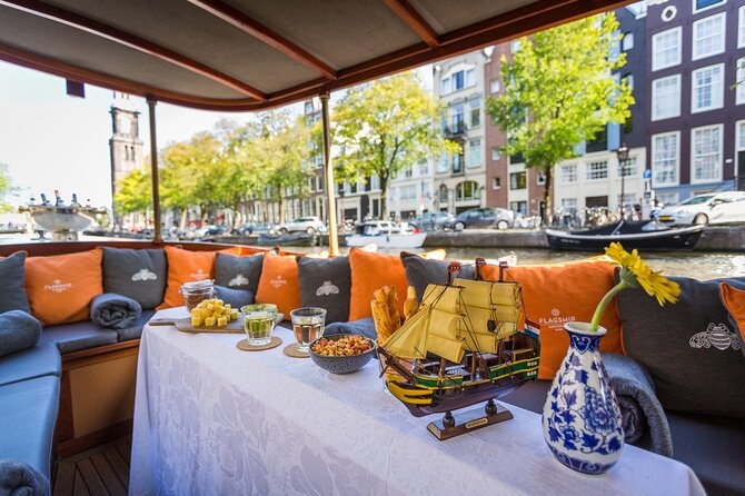 Amsterdam Small-Group Bike Tour With Canal Cruise, Drinks, Cheese - Bike comfort and traffic: who this tour is best for