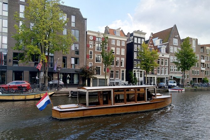 Amsterdam small-group canal cruise in 1920s saloon boat - Why the small group (max 12) changes everything