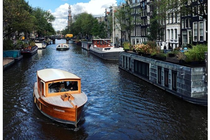Amsterdam small-group canal cruise in 1920s saloon boat - Who should book this 1928 cruise, and who might skip it