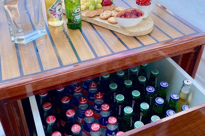 Amsterdam Small-Group Canal Cruise Including Snacks and Drinks - National Maritime Museum area, Golden Age ships, and Hortus Botanicus