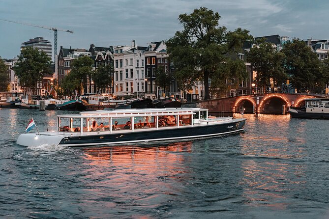 Amsterdam Small-Group Evening Canal Cruise Including Wine, Craft Beer, Cheese - Night Canal Views: why this loop works so well after dark