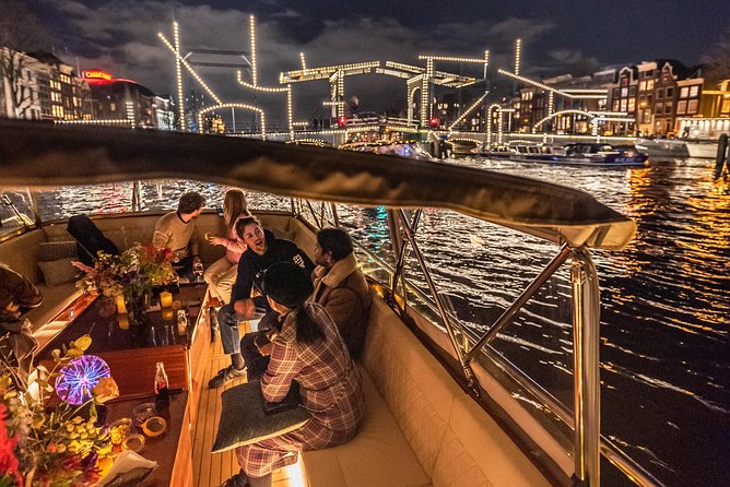 Amsterdam Small-Group Evening Canal Cruise Including Wine, Craft Beer, Cheese - Hosts on board: when the stories lift the whole cruise
