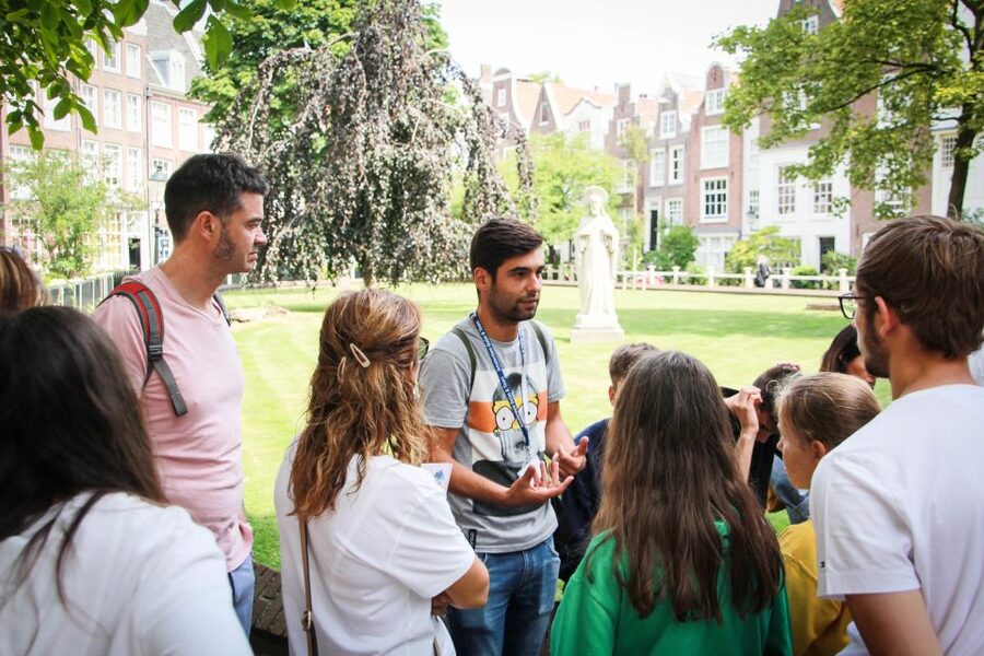 Amsterdam Small-Group Walking Tour - Beursplein to Dam Square: a first-day route that actually helps