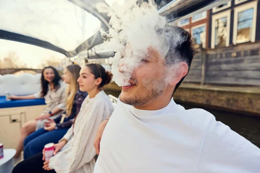 Amsterdam: Smoke & Cruise on covered Cannabis Boat With Bar - Key things that make this Smoke & Cruise different