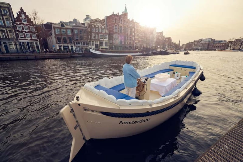 Amsterdam: Smoke & Cruise on covered Cannabis Boat With Bar - Onboard bar, drinks, and the no-music canal rule