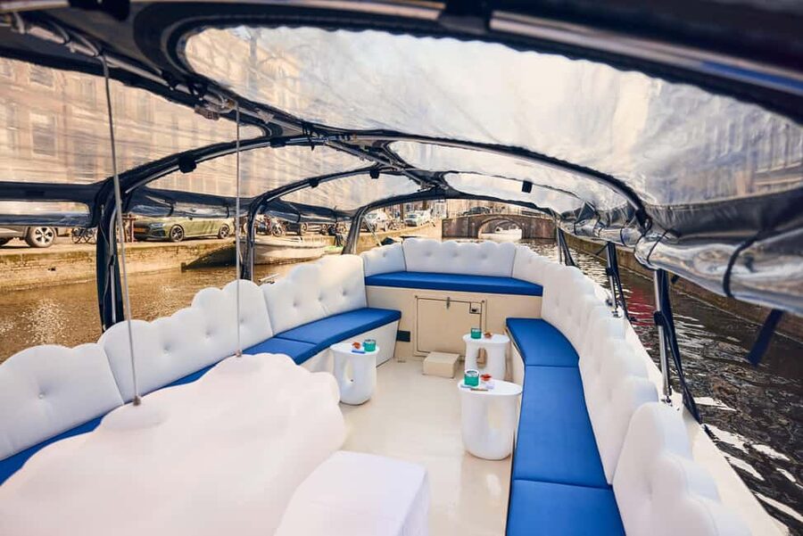 Amsterdam: Smoke & Cruise on covered Cannabis Boat With Bar - Best time to book: day views or Amsterdam lights