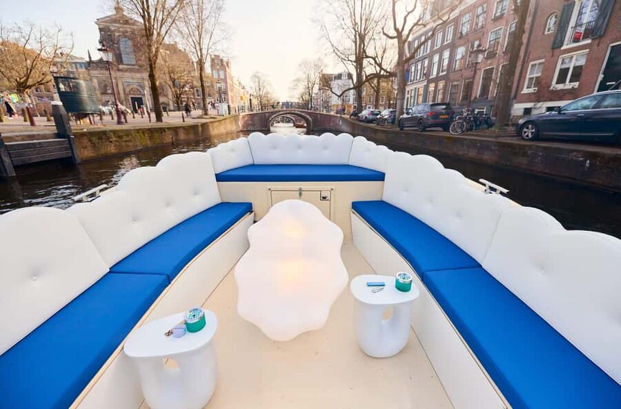 Amsterdam: Smoke & Cruise on covered Cannabis Boat With Bar - The one-hour route: from Oudezijds Voorburgwal to Seven Bridges