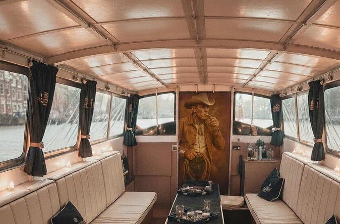 Amsterdam Smoke Friendly Cruise with drinks option & local guide - The guide experience: captain-led storytelling that can run from funny to plain