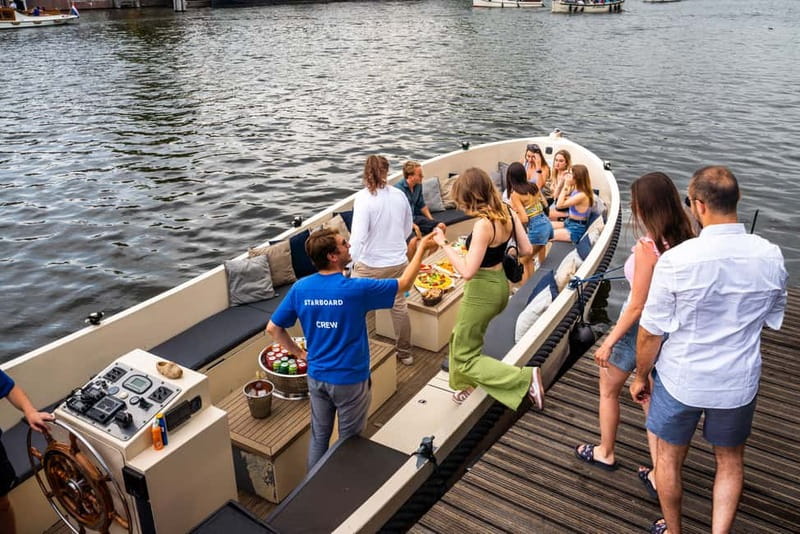 Amsterdam: Spanish Guided Open Boat Cruise with Bar Onboard - Price and value: is $22 a good deal for this canal hour?