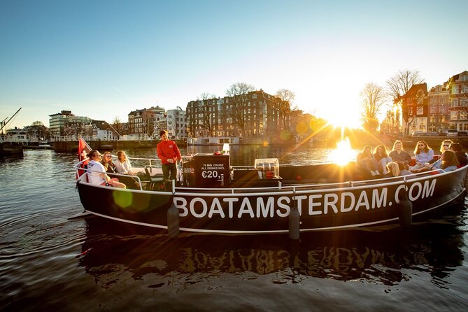 Amsterdam Sunset Canal Cruise with Live Guide and Open Bar - The open bar setup: Heineken, wine, soft drinks, and coffee/tea