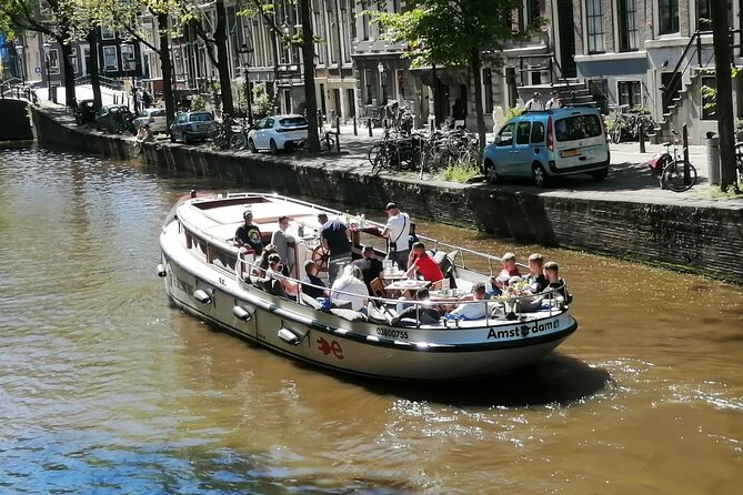 Amsterdam: The Bulldog Boat Smoke-Friendly Cruise & 2 Drinks - Boat setup and comfort: half-open cruising takes planning