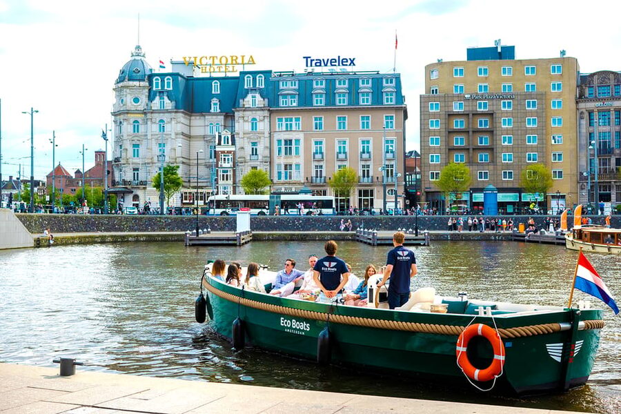 Amsterdam: The Newest Canal Cruise with Drink Option - Old churches, the Red Light District pass, and Zeedijk from the water