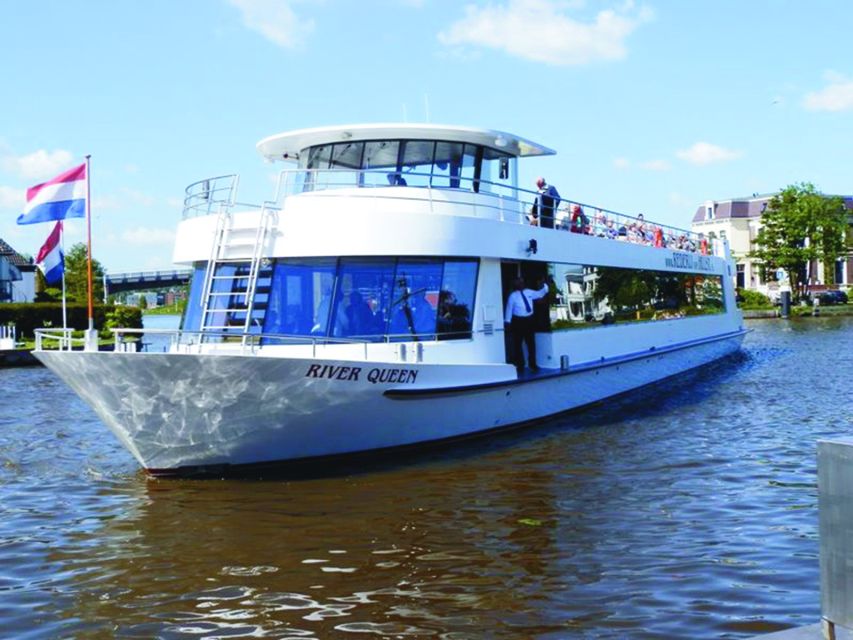 Amsterdam: Tour to Keukenhof Gardens with Windmill Cruise - Kaag Lakes cruise and working windmills near Warmond